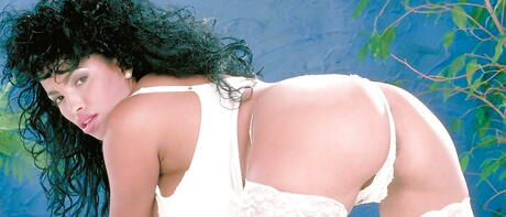 Charming brazilian milf Busty Angelique denudes big knockers and hairy pussy 