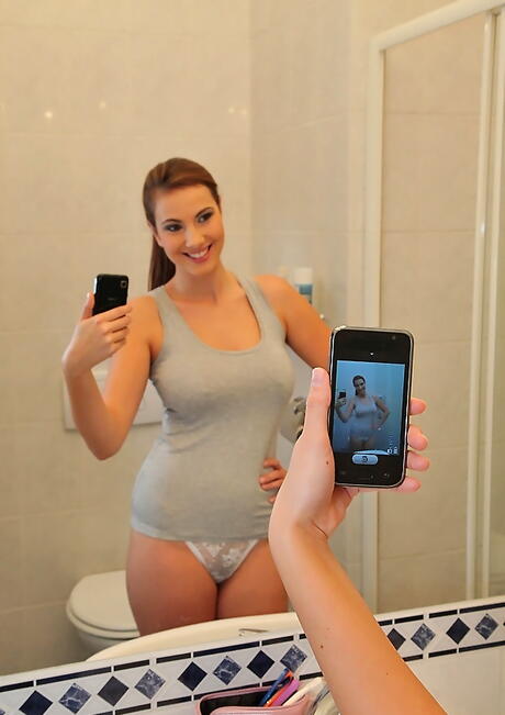 Glamorous hottie Conny Carter in erotic scene in the bathroom