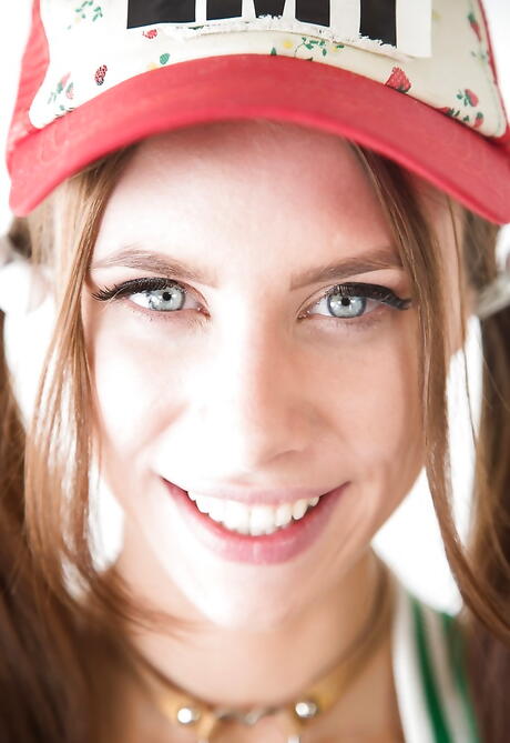 Shapely american brunette Anya Olsen exposing small tits and shaved pussy 