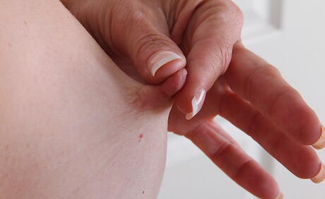 Very attractive mature Alley showing small tits and hairy pussy 