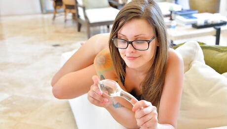 Slim teen Shea bares her butt in glasses and toys her pussy 